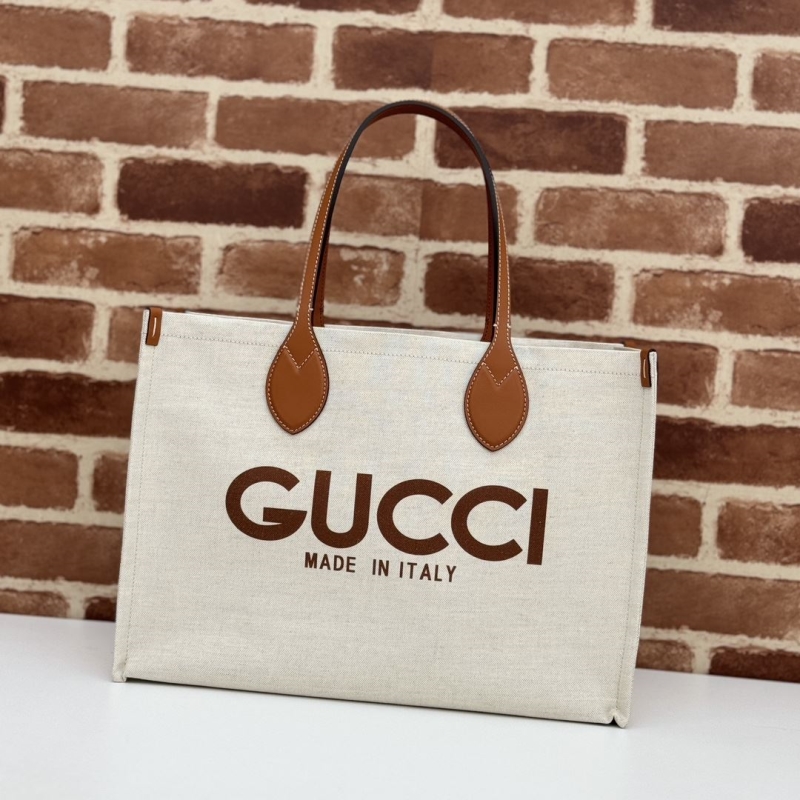 G*u*i shopping bags